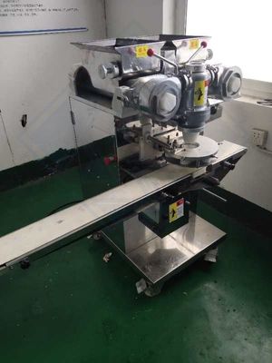 Αυτόματη μηχανή με τη λειτουργία πλήρωσης μπισκότων Μηχανή με την λειτουργία πλήρωσης μπισκότων